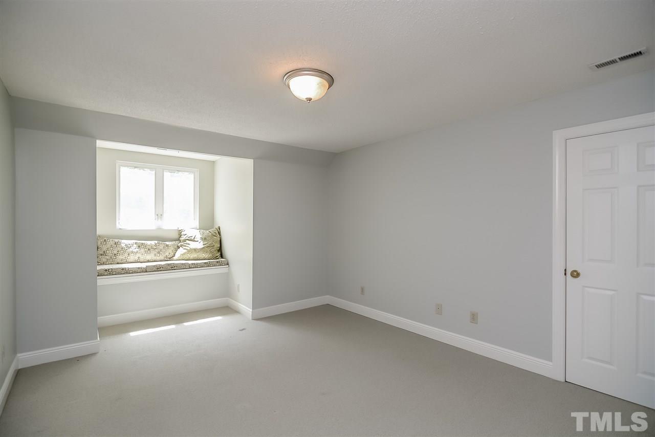 12925 Ghoston Road Wake Forest, NC 27587 - Photo 17 of 24 Upstairs bedroom with Window Seat.