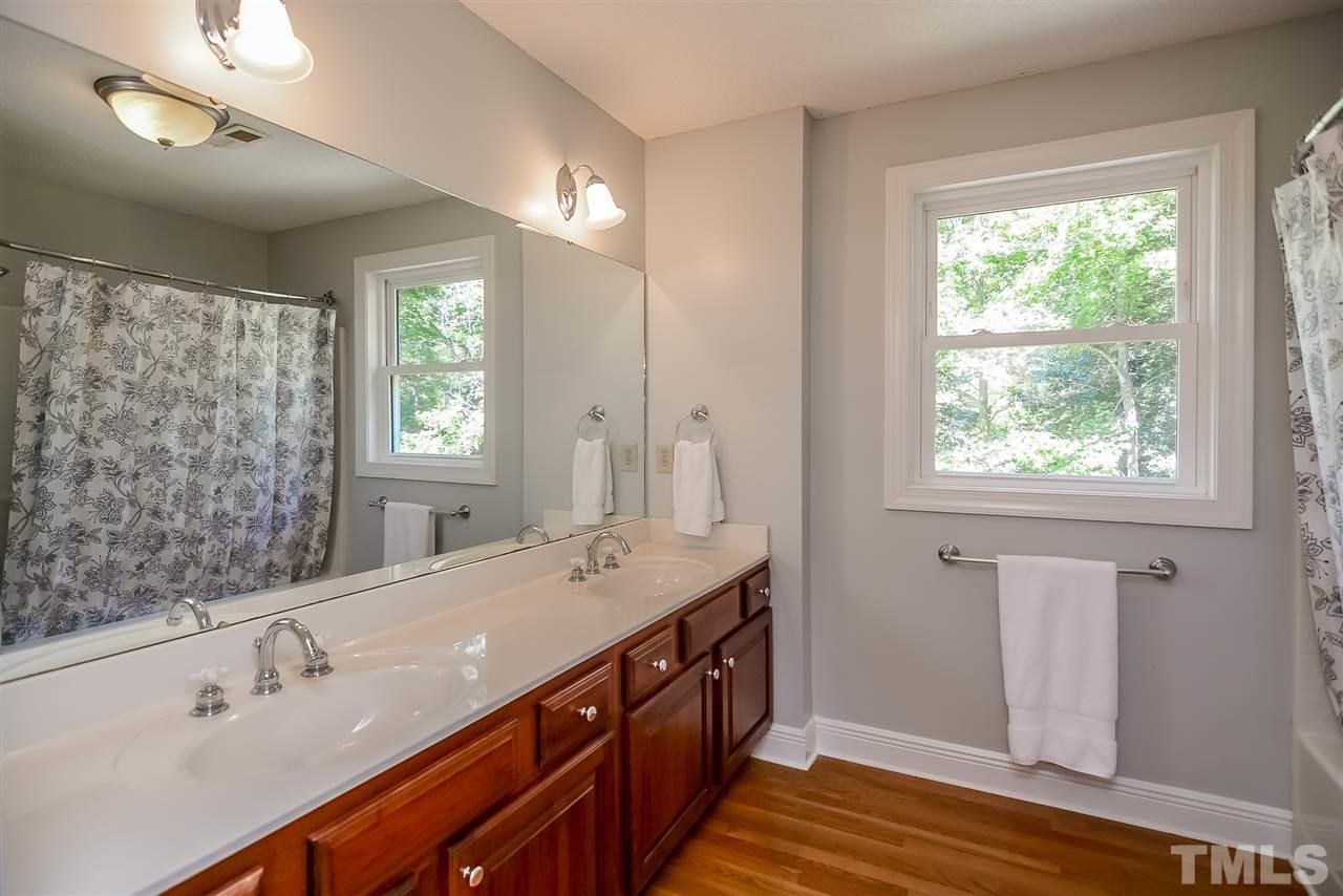12925 Ghoston Road Wake Forest, NC 27587 - Photo 20 of 24 Located on 2nd floor. Dual Sinks and plenty of counter space. Tub/Shower.
