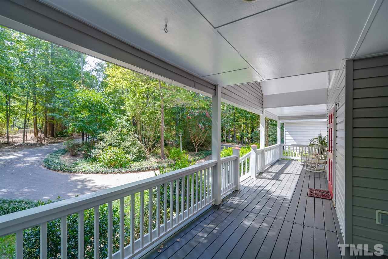12925 Ghoston Road Wake Forest, NC 27587 - Photo 3 of 24 Rocking chair front porch.
