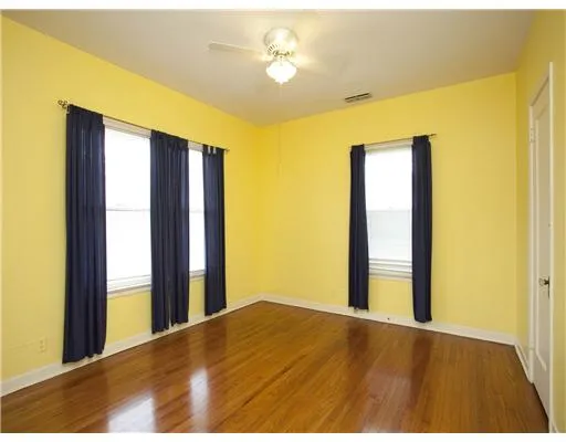 a view of a room with a large window