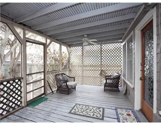 a view of a chairs and table on the deck