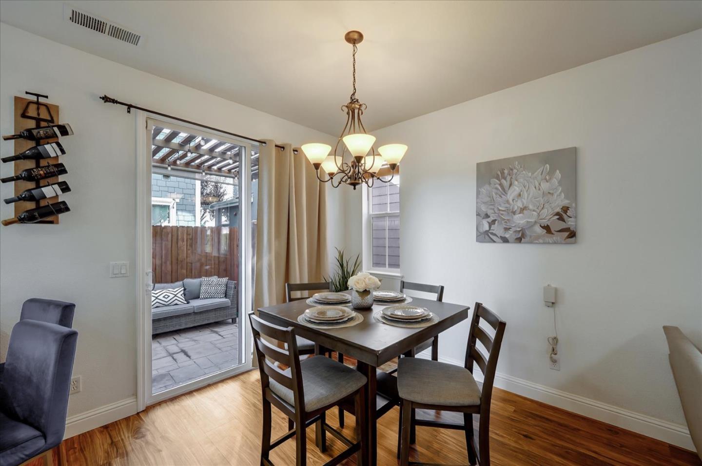 7929 Kipling Circle Gilroy, CA 95020 - Photo 15 of 39 a view of a dining room with furniture window and wooden floor
