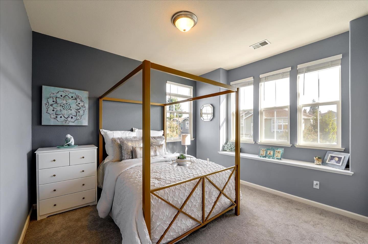 7929 Kipling Circle Gilroy, CA 95020 - Photo 18 of 39 a bedroom with furniture and windows