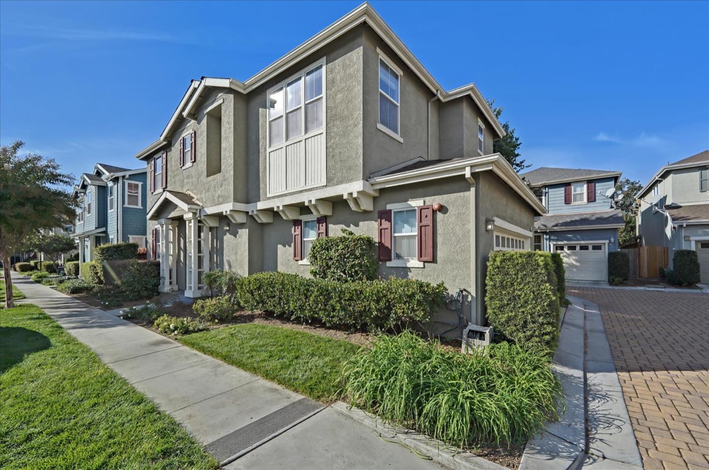 7929 Kipling Circle Gilroy, CA 95020 - Photo 3 of 39 a front view of a house with garden