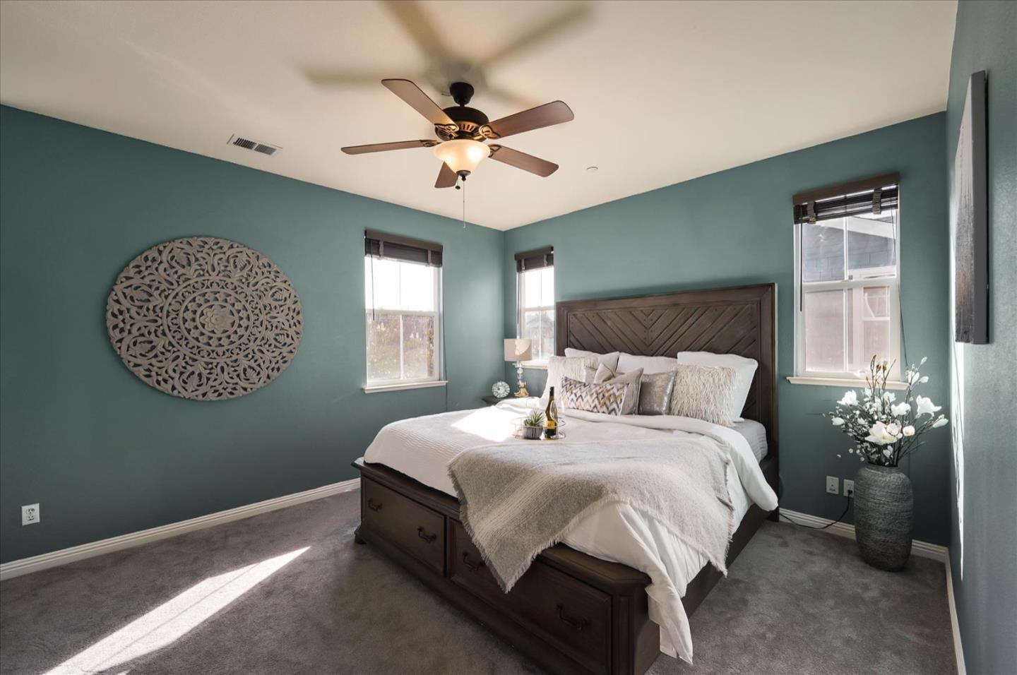 7929 Kipling Circle Gilroy, CA 95020 - Photo 24 of 39 a bedroom with a bed mirror and window