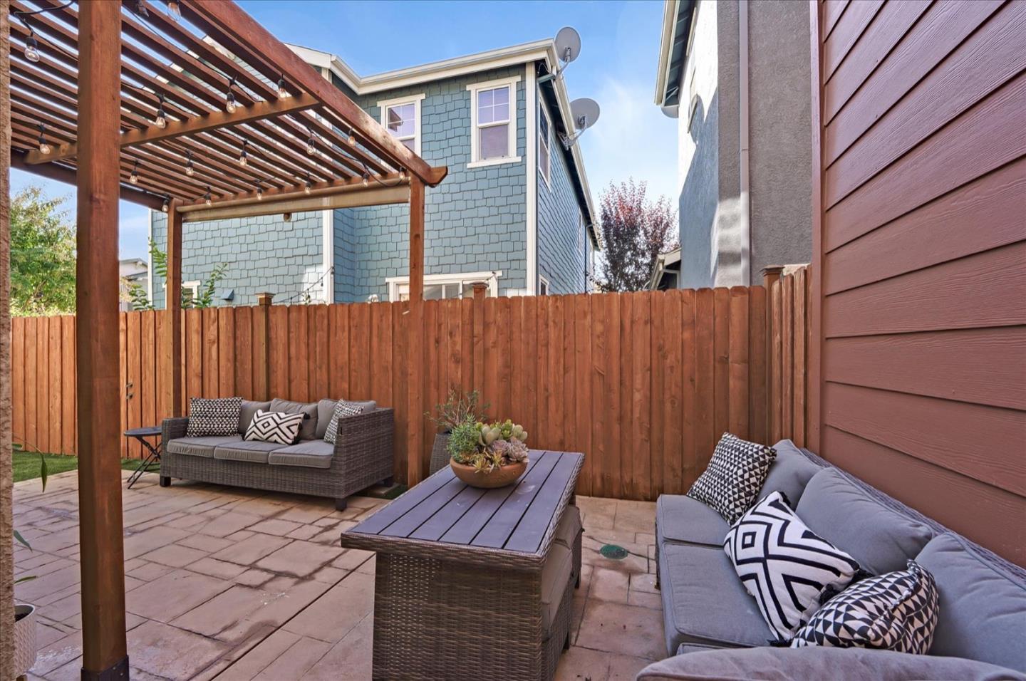 7929 Kipling Circle Gilroy, CA 95020 - Photo 36 of 39 a view of a patio with couches and potted plants
