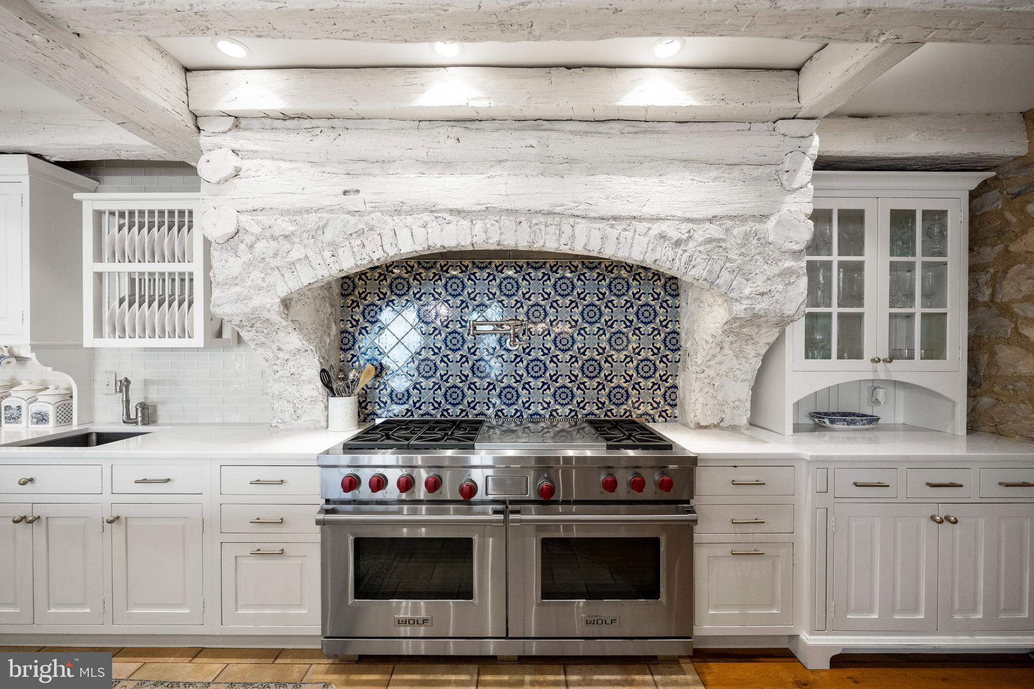 1500 Church Road Malvern, PA 19355 - Photo 12 of 80 2 Wolf ovens in this large stone and tile hearth