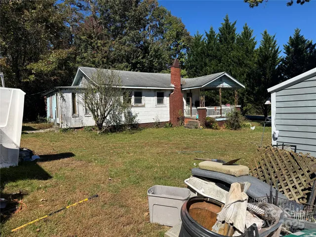 a house that has tree in front of it