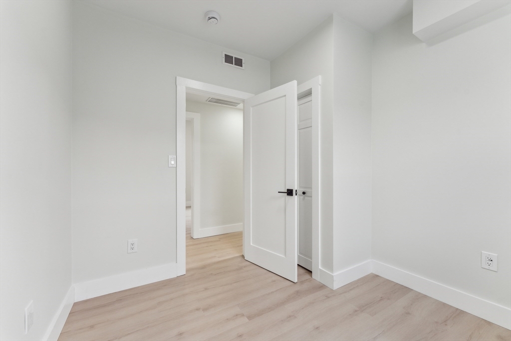 47 Brackett Street, Unit 3 Boston, MA 02135 - Photo 15 of 34 a view of an empty room