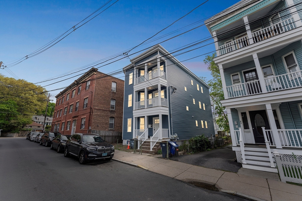 47 Brackett Street, Unit 3 Boston, MA 02135 - Photo 34 of 34 a view of a building with a street