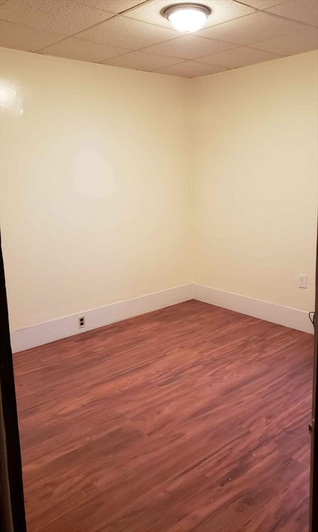37 Vernon Street Worcester, MA 01610 - Photo 8 of 8 a view of a room with wooden floor