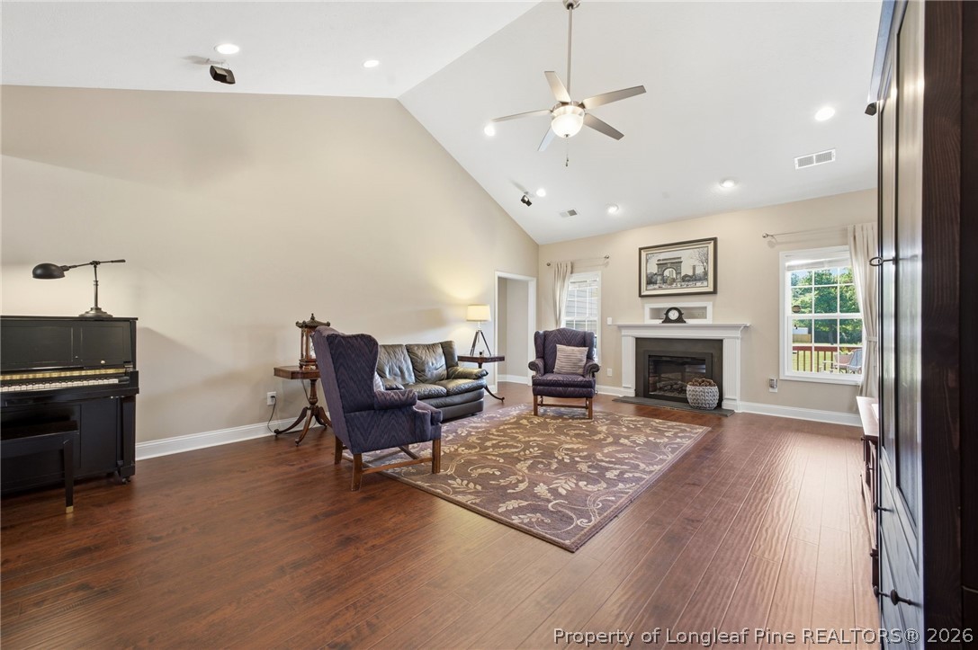 2589 June Johnson Road Raeford, NC 28376 - Photo 14 of 49 a living room with furniture and a fireplace