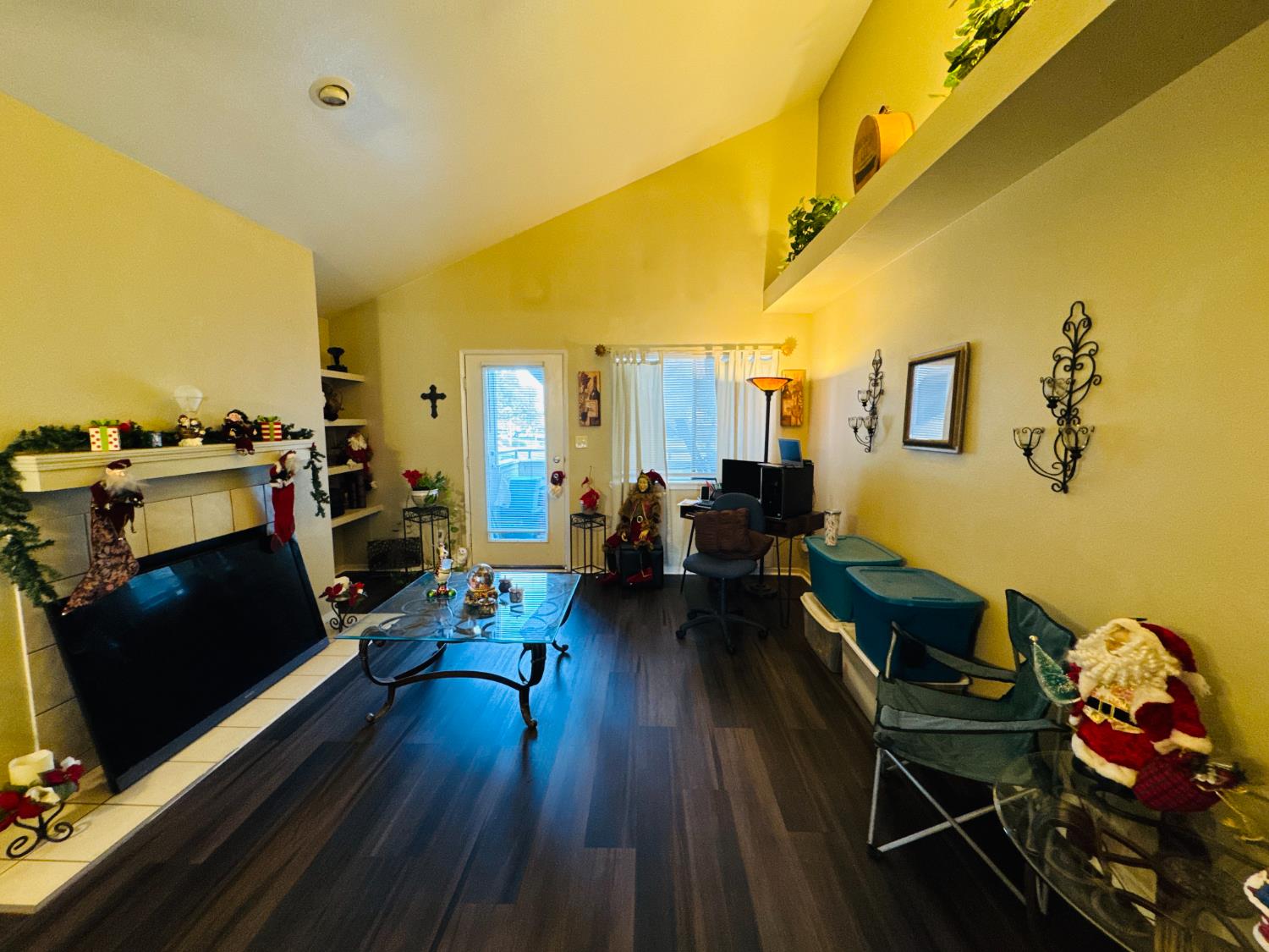 7675 North First Street, Unit 202 Fresno, CA 93720 - Photo 7 of 19 a living room with furniture and a flat screen tv