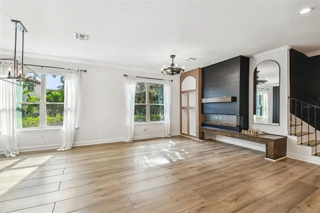 a view of a livingroom with a kitchen