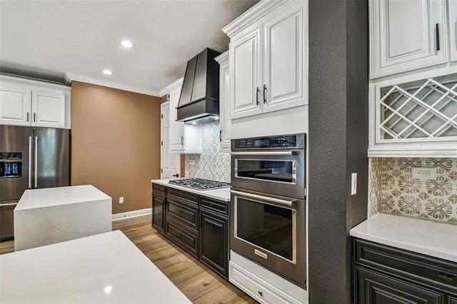a view of a kitchen with a sink and a kitchen