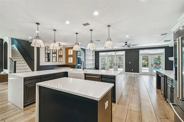 a view of kitchen with cabinets and wooden floor