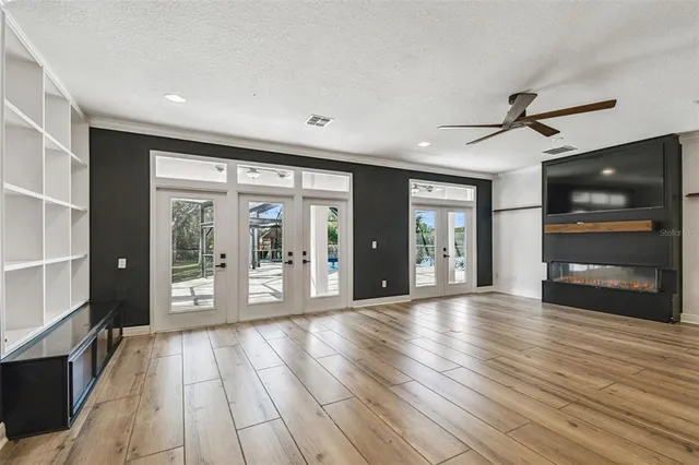 a view of living room with wooden floor