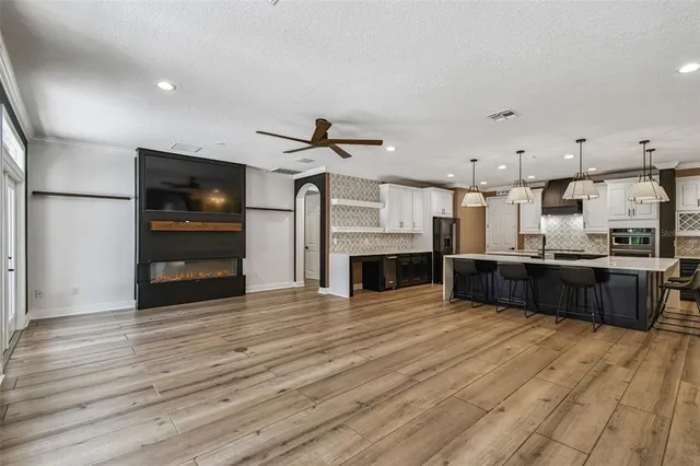a bathroom with a double vanity sinks and a mirror