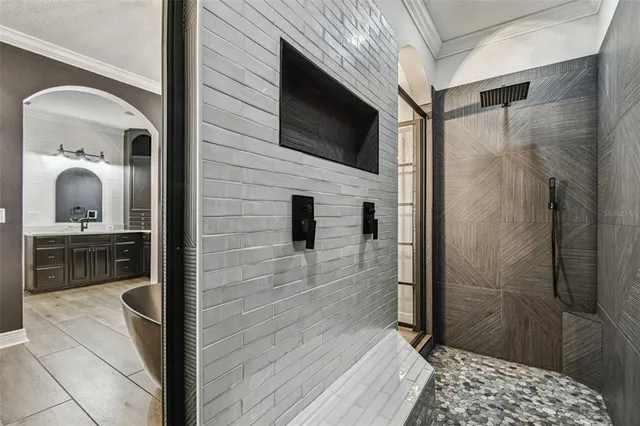 a bathroom with a toilet a sink and shower