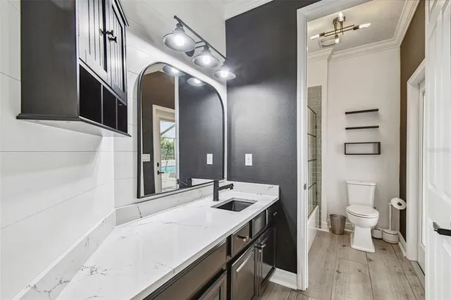 a view of a livingroom with wooden floor