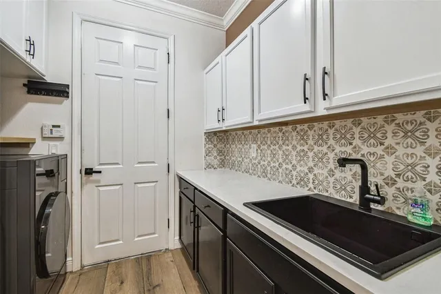 a bathroom with a shower and mirror