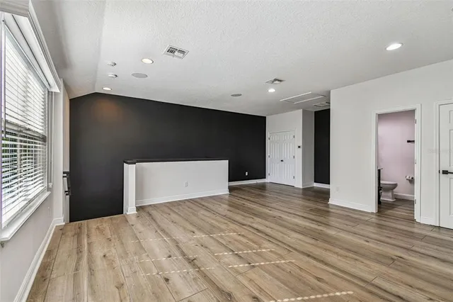 a view of yard with a patio