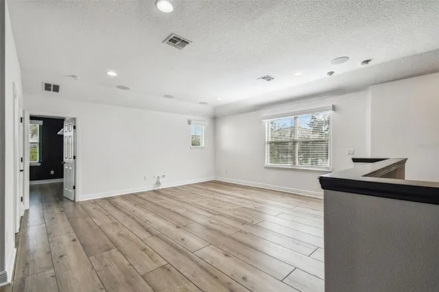 a view of swimming pool with a patio