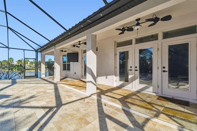 an aerial view of ocean residential house with outdoor space and swimming pool