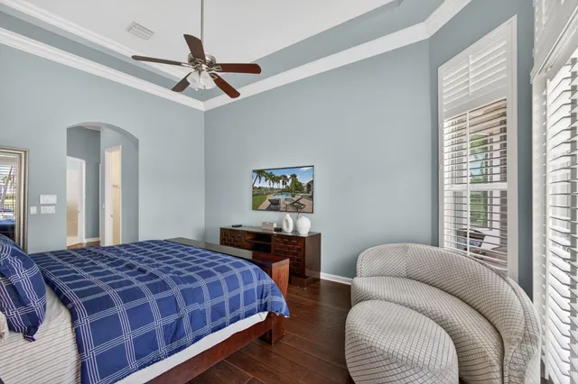 a view of a swimming pool with a table and chairs