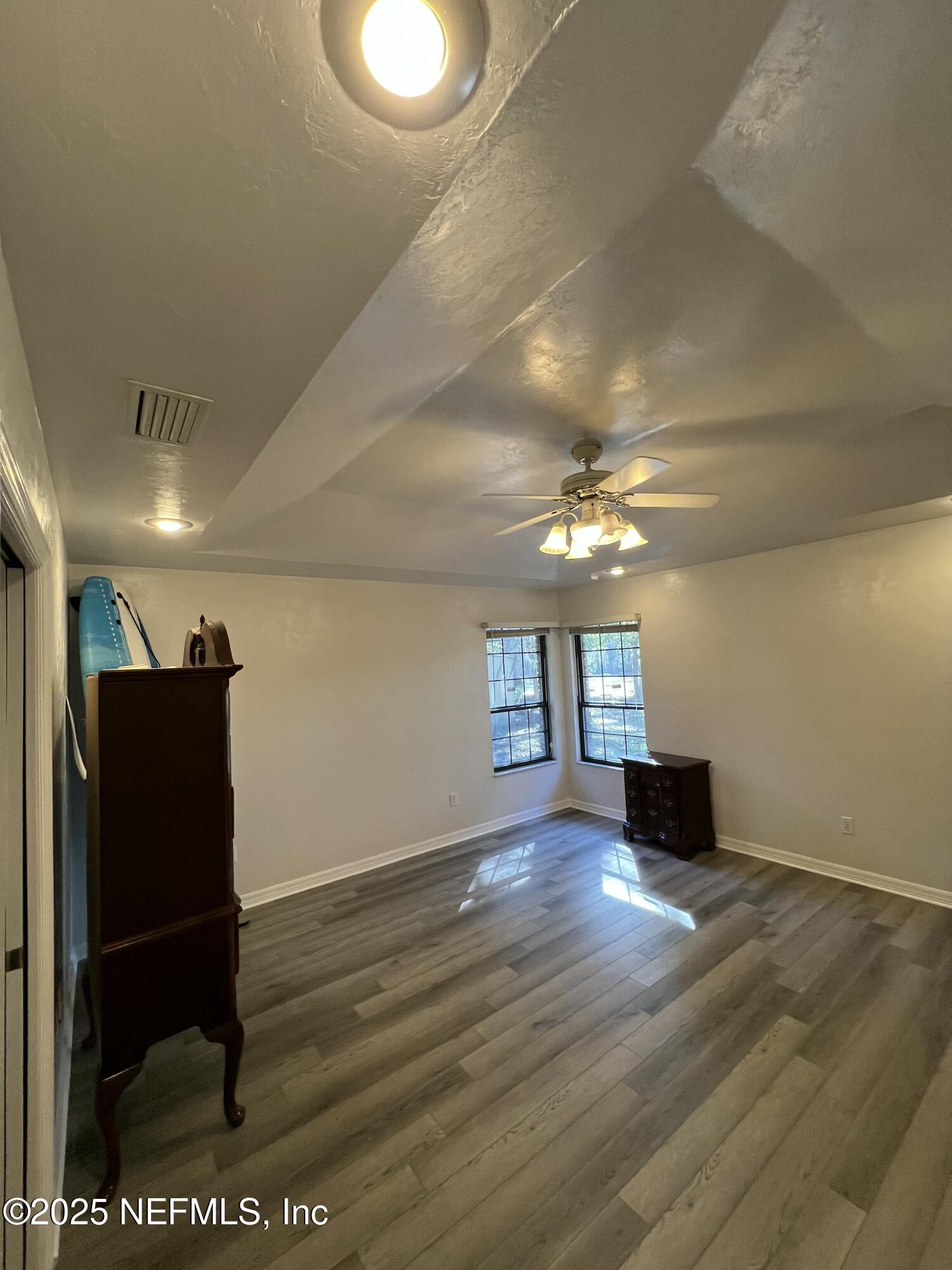 1825 Raiford Road Starke, FL 32091 - Photo 20 of 92 a view of a hallway with wooden floor