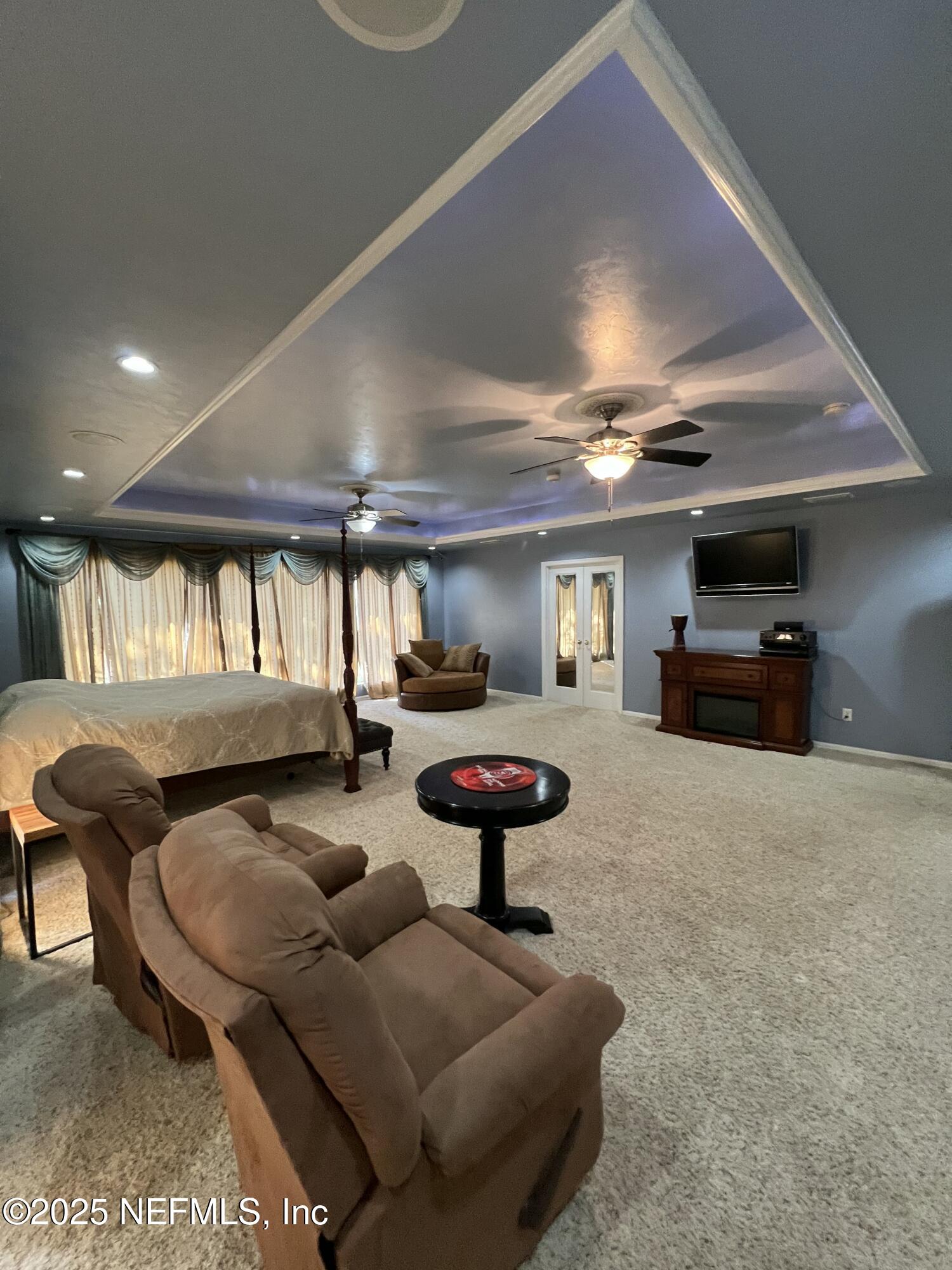 1825 Raiford Road Starke, FL 32091 - Photo 39 of 92 a living room with furniture and a large window