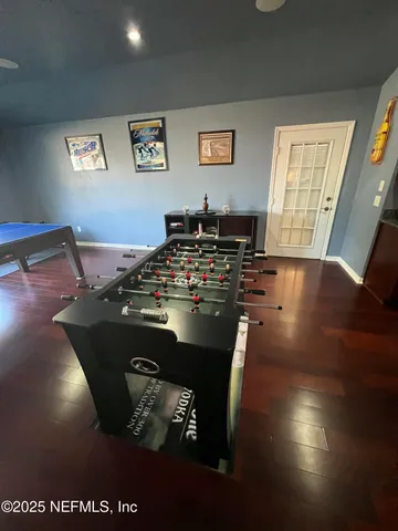 a view of a house with a yard and garage