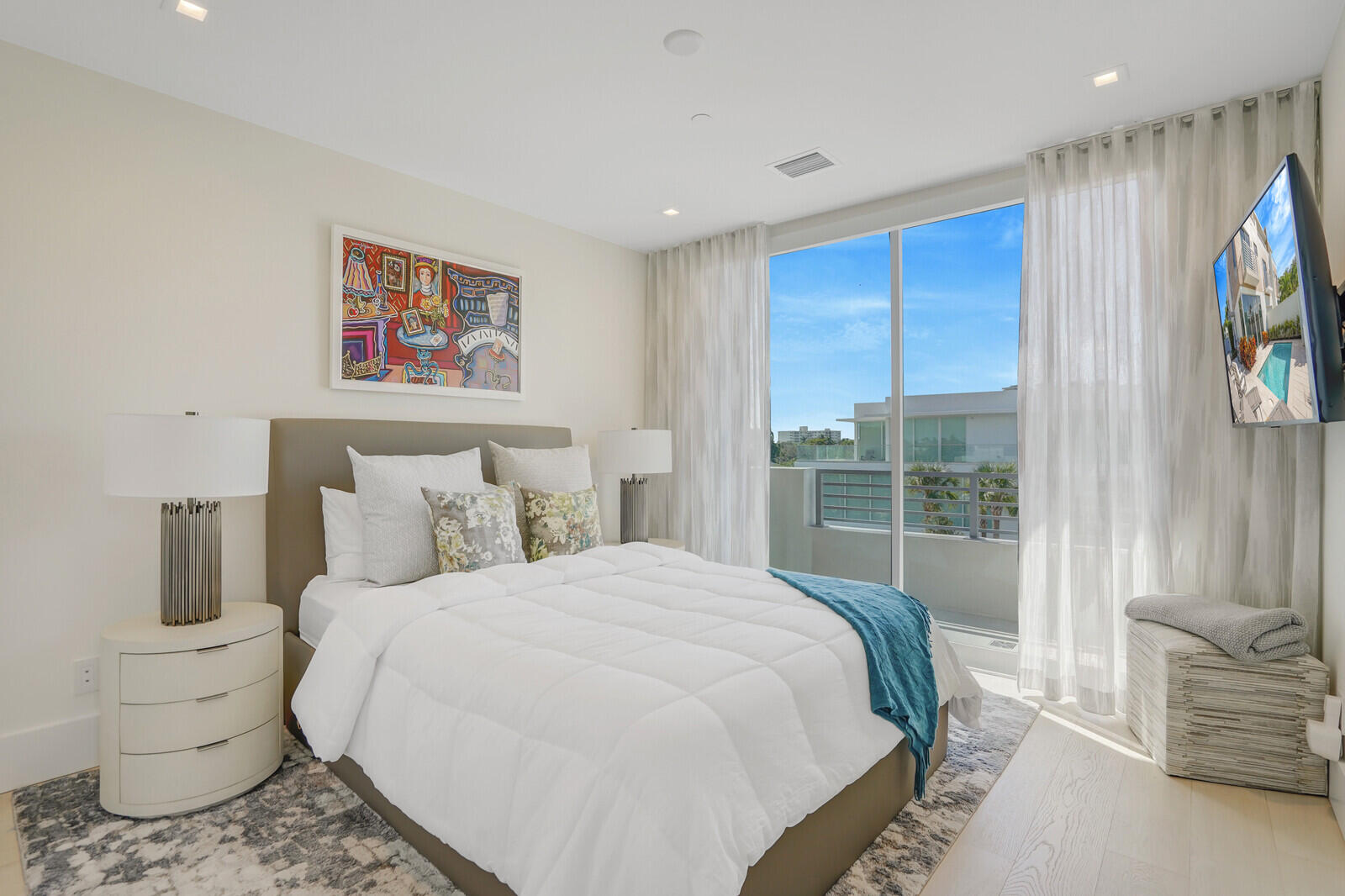 200 Northeast 7th Avenue, Unit 3 Delray Beach, FL 33483 - Photo 33 of 71 a bedroom with a bed and glass window