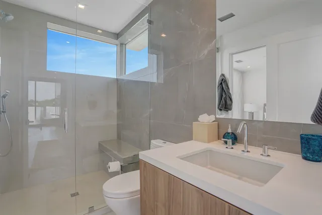 a view of a swimming pool with a lounge chair