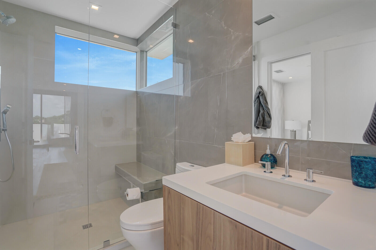 200 Northeast 7th Avenue, Unit 3 Delray Beach, FL 33483 - Photo 35 of 71 a bathroom with a sink a toilet and shower