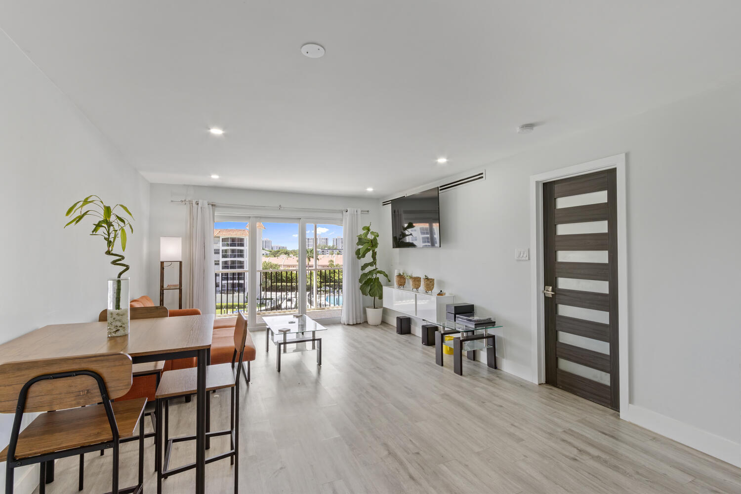 2871 North Ocean Boulevard, Unit V443 Boca Raton, FL 33431 - Photo 11 of 49 a dining room with furniture and wooden floor
