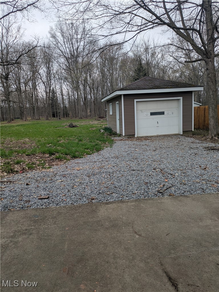 9581 Colton Road Windham, OH 44288 - Photo 4 of 26 Detached garage with fence
