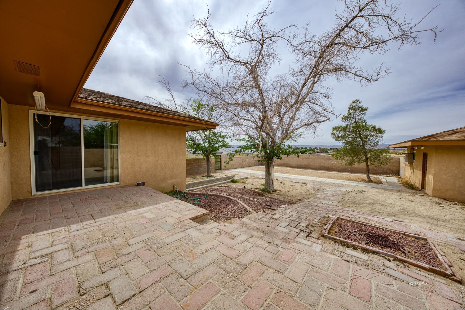 1313 Autumn Avenue Ridgecrest, CA 93555 - Photo 37 of 50 a view of a backyard of a house