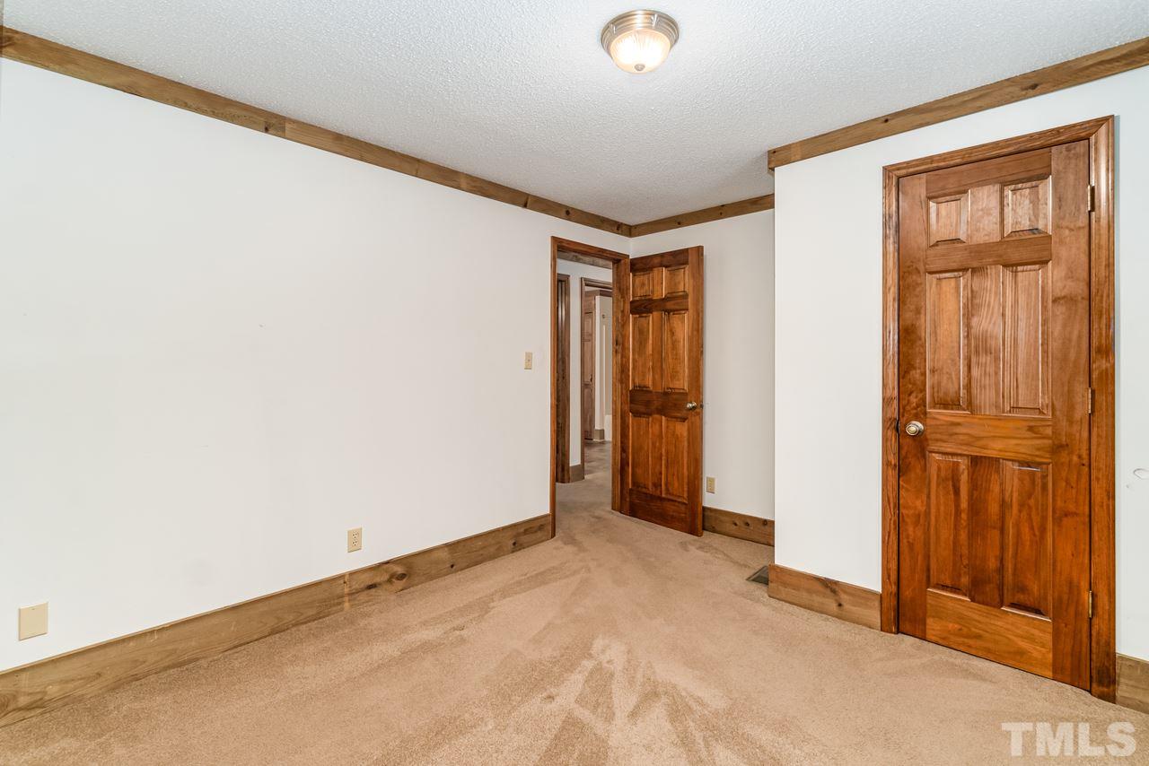 148 Nutbush Road Manson, NC 27553 - Photo 17 of 30 an empty room with windows