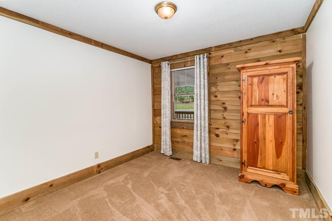 148 Nutbush Road Manson, NC 27553 - Photo 18 of 30 an empty room with walk in closet and window