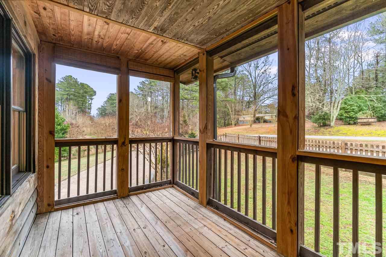 148 Nutbush Road Manson, NC 27553 - Photo 23 of 30 a view of wooden balcony with wooden floor
