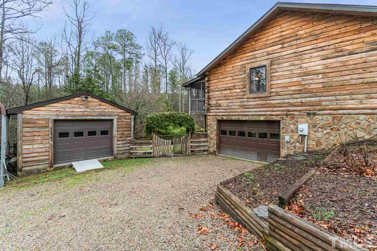 148 Nutbush Road Manson, NC 27553 - Photo 4 of 30 a front view of a house with a yard