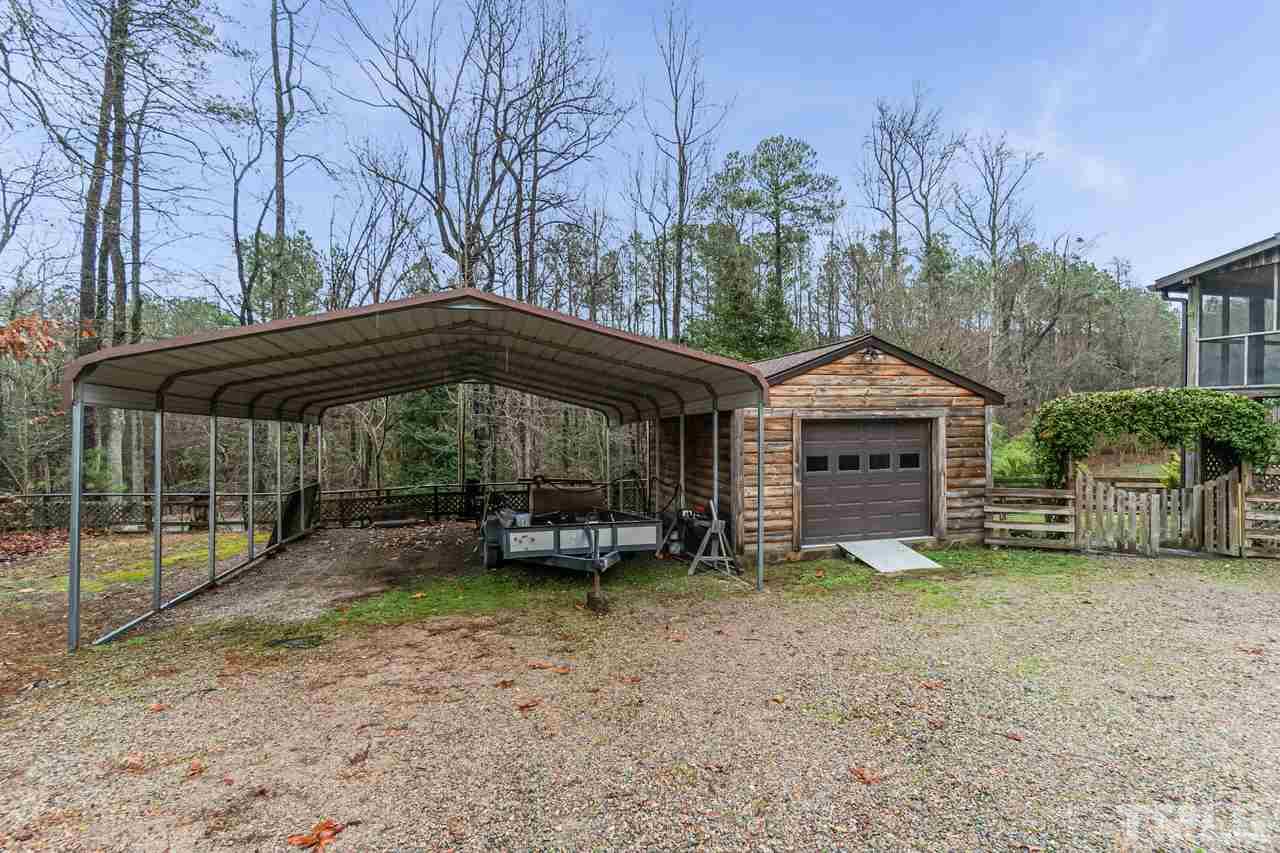 148 Nutbush Road Manson, NC 27553 - Photo 5 of 30 a view of a house with a yard