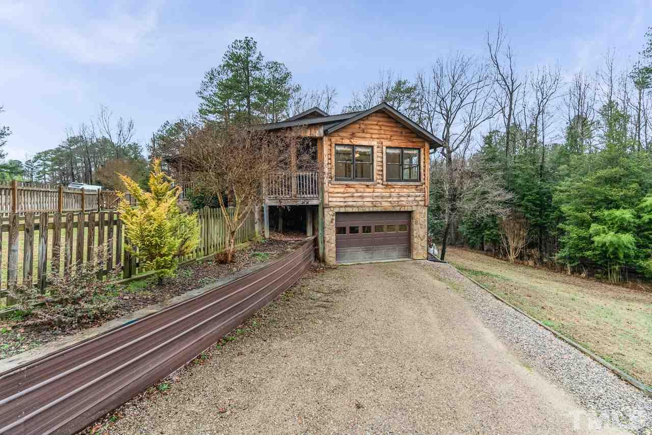 148 Nutbush Road Manson, NC 27553 - Photo 6 of 30 a front view of a house with a yard