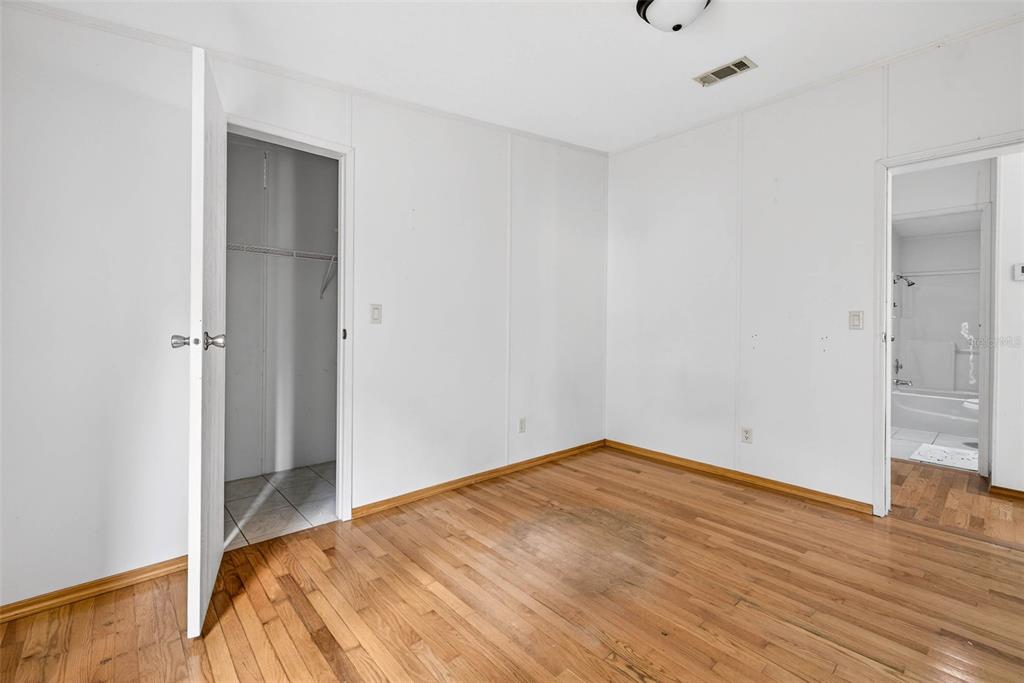 6781 West Grant Street Homosassa, FL 34448 - Photo 11 of 24 a view of empty room with wooden floor