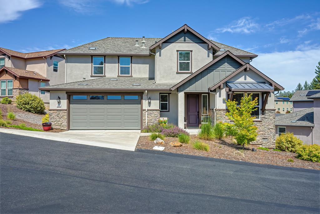 504 Chase Court Colfax, CA 95713 - Photo 18 of 94 a front view of a house with a yard and garage