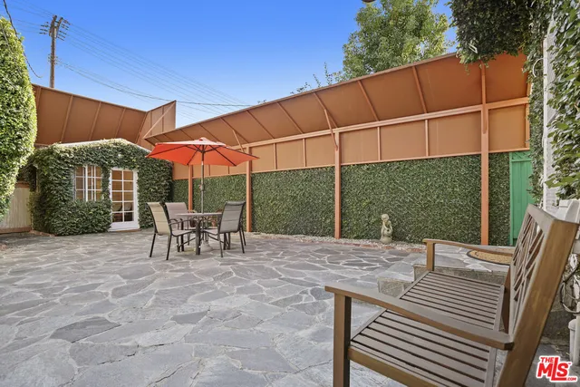 an aerial view of a house with swimming pool