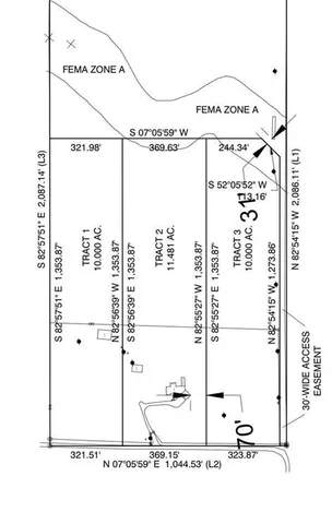 an aerial view of residential house with outdoor space