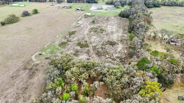 a view of a road with a yard
