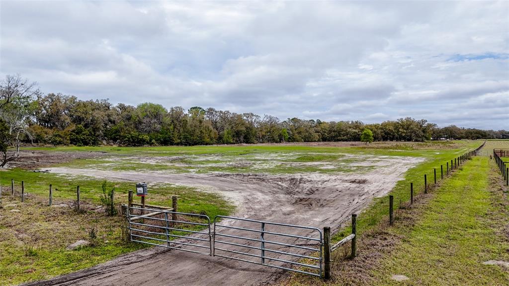 Northeast 160th Avenue Williston, FL 32696 - Photo 2 of 44 a view of a swimming pool with an ocean view